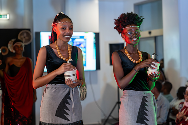 Students walking down a runway in fashion show