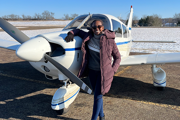 Woman with small airplane