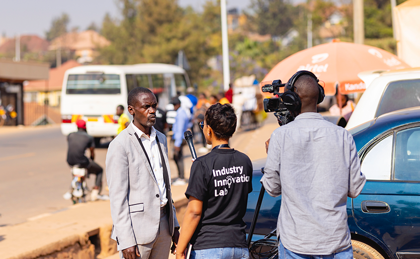 Person being interviewed in Kigali street