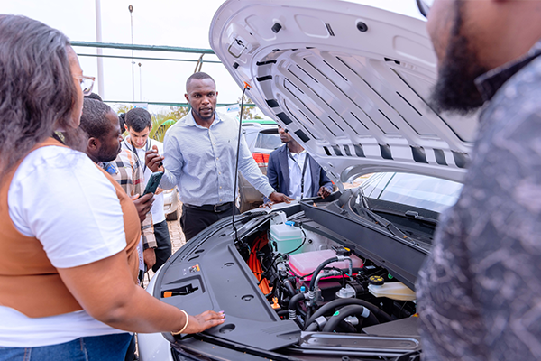 Man showing car engine