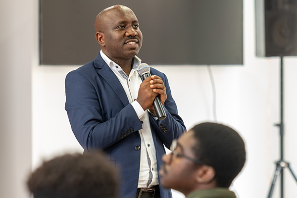 Man speaking into microphone