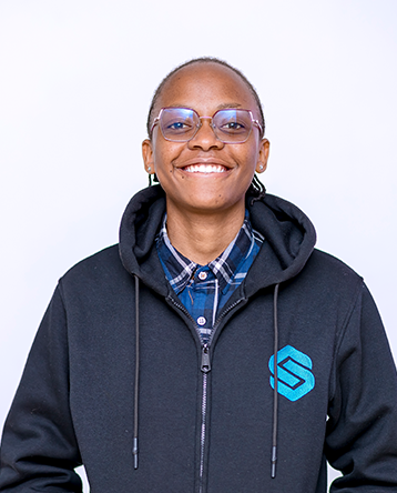 A female student wearing a Signvrse hoodie