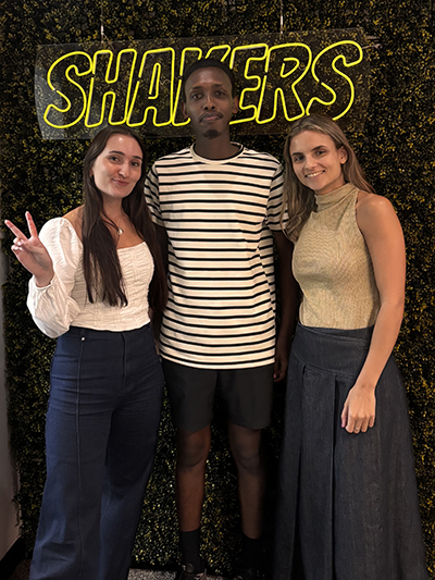 The student with two women