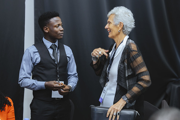 A woman and a man talking