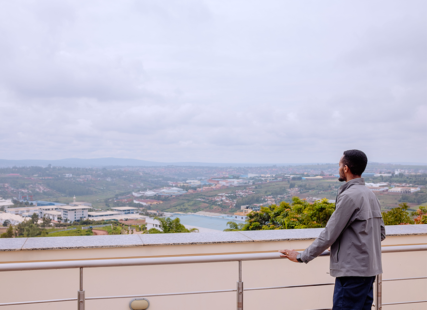 Man overlooking the Kigali landscape